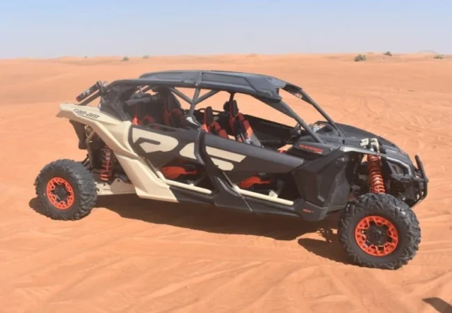 4 Seater Can-Am Maverick X3 dune buggy in Lahbab red dunes Dubai - Desert Buggy Rental Dubai