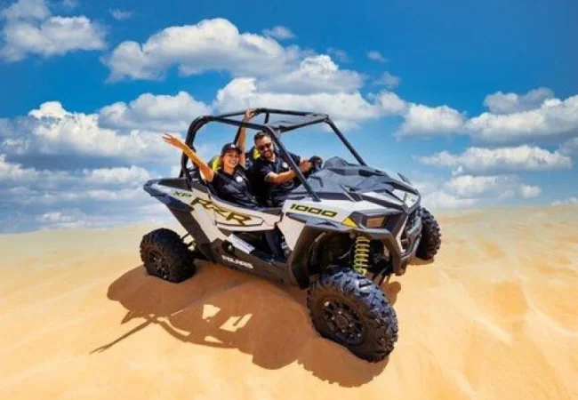 2 Seater Polaris RZR 1000cc dune buggy in Lahbab red dunes Dubai - Desert Buggy Rental Dubai