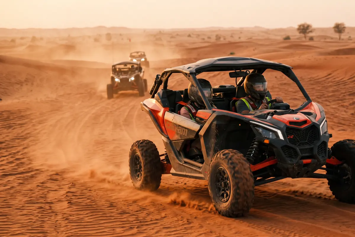 Can-Am Maverick R 240HP cockpit detail with harnesses and roll cage in Dubai desert
