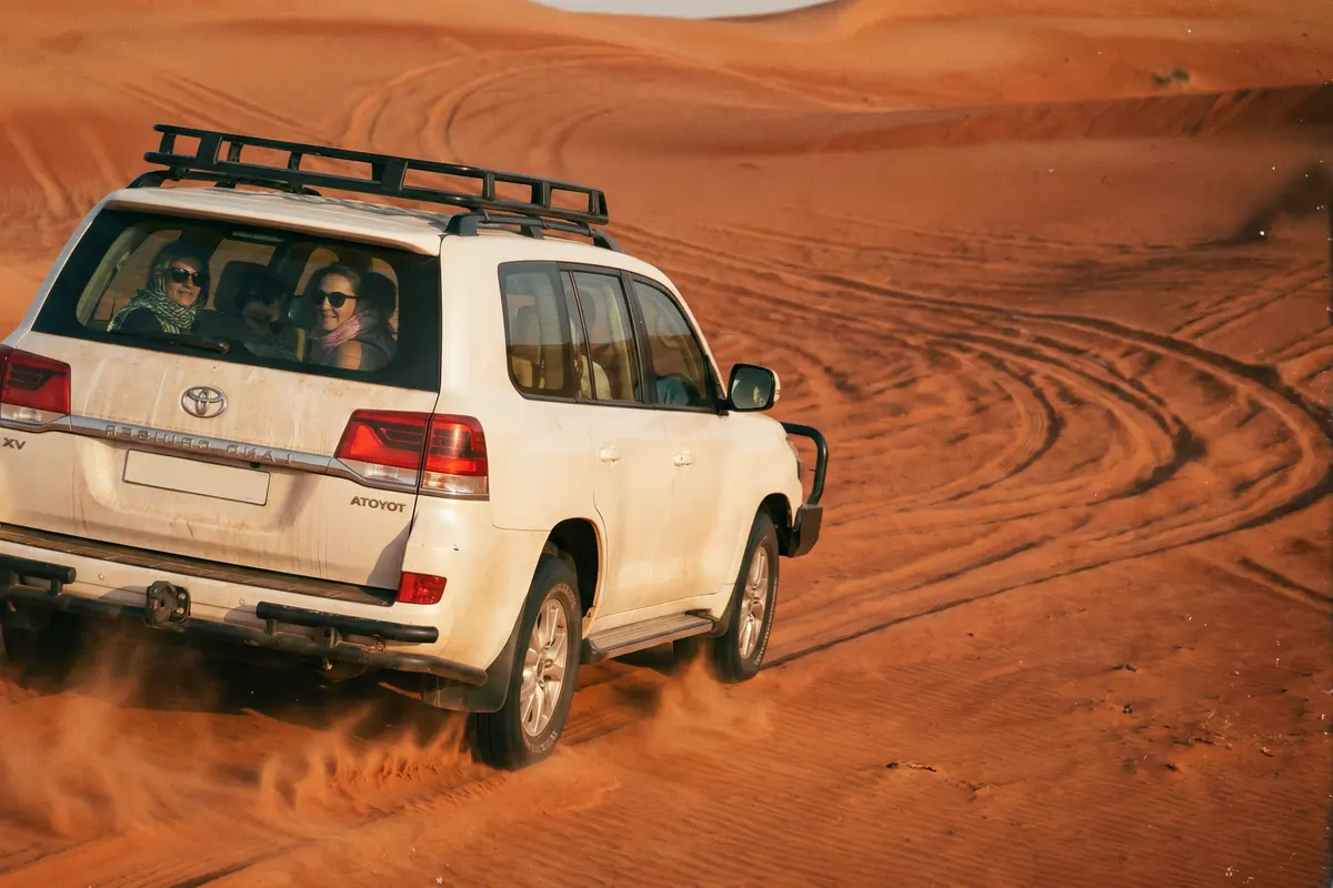 Evening Desert Safari Dubai desert safari scene in Lahbab red dunes Dubai - Desert Buggy Rental Dubai