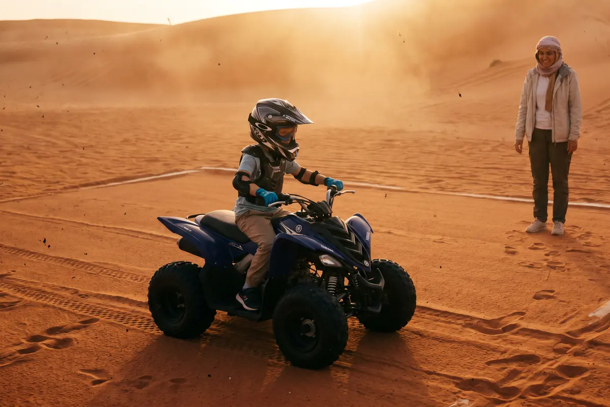 Yamaha 90cc Kids Quad Dubai Yamaha quad bike ride in Lahbab red dunes Dubai - Desert Buggy Rental Dubai