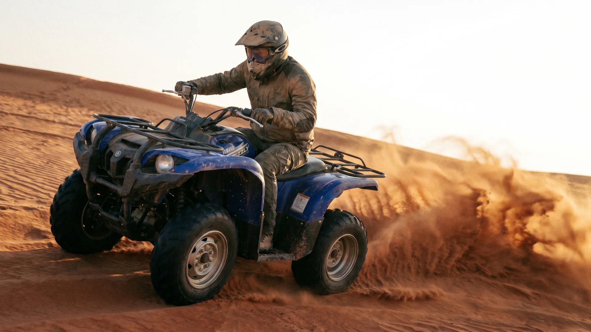 Yamaha Grizzly 450cc in Lahbab red dunes Dubai - Desert Buggy Rental Dubai