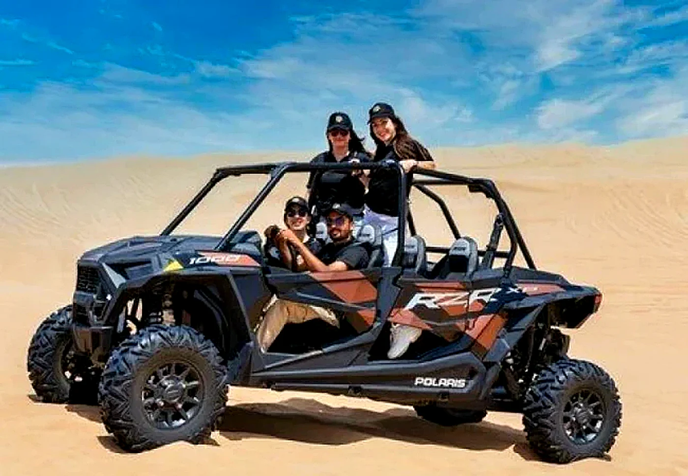 4 Seater Polaris RZR 1000cc dune buggy in Dubai red dunes - Desert Buggy Rental Dubai