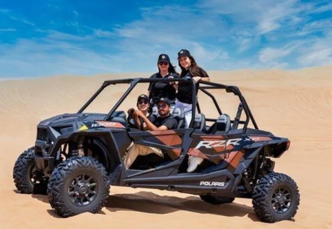 4 Seater Polaris RZR 1000cc dune buggy in Dubai red dunes - Desert Buggy Rental Dubai