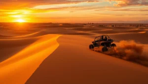 Desert buggy driving along a dune ridge at sunset, kicking up sand on a Dubai desert adventure