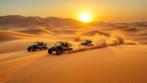 Three sand buggies racing across the dunes at sunset, trailing dust on a Dubai desert tour