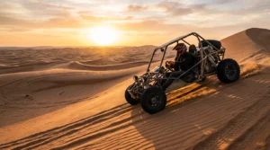 Self-drive dune buggy racing across golden Abu Dhabi desert dunes at sunset