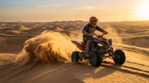 First-time rider safely driving a self-drive dune buggy across Sharjah desert dunes at golden hour