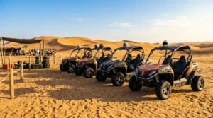 Row of open two-seat dune buggies with helmets on the seats at a Dubai desert rental camp