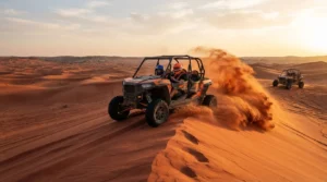 Dune buggy powering over a red dune crest on a sand dune buggy trip in the Dubai and Sharjah desert